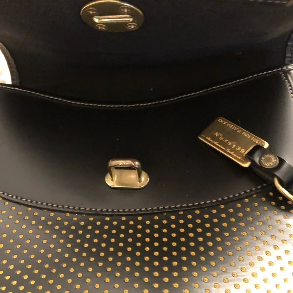 Dooney & Bourke Cabrio black leather laser cut w/ tag & serial number, vintage